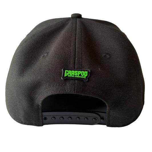 Black cap with a green and white logo on the back against a white background