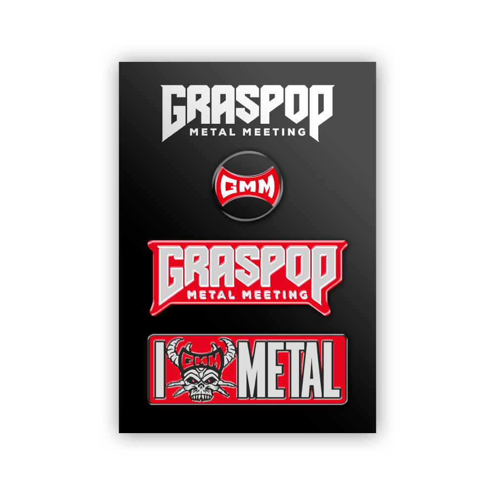 Collection of Graspop Metal Meeting merchandise including pins on a black background.