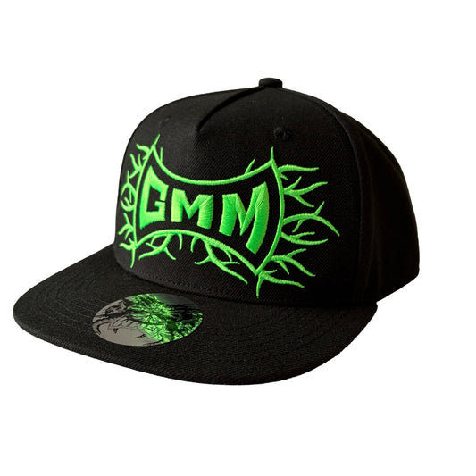 Black cap with green 'GMM' logo on a white background